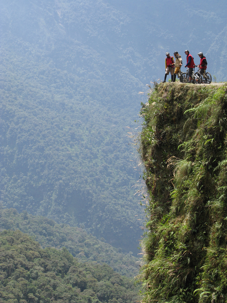 Cycling death road in Bolivia has views and literal pit-falls like this.