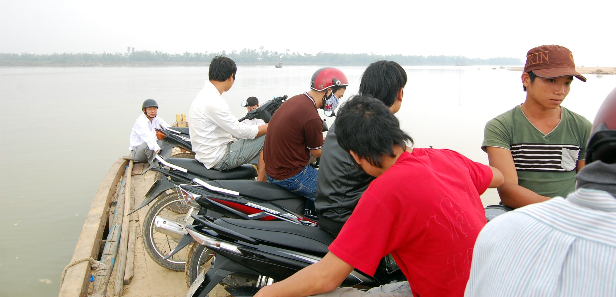 Ferrying motorbikes in rural east Vietnam.