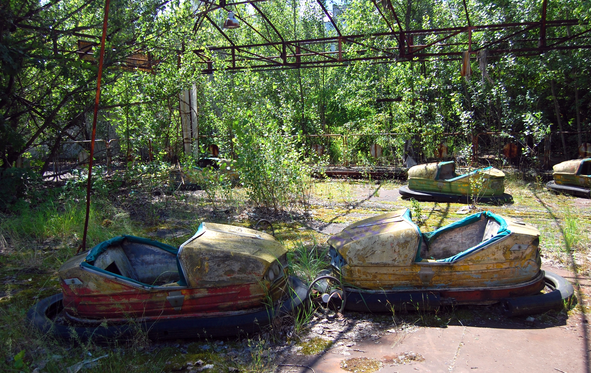 Visiting Chernobyl includes seeing bumper cars at a fairground.
